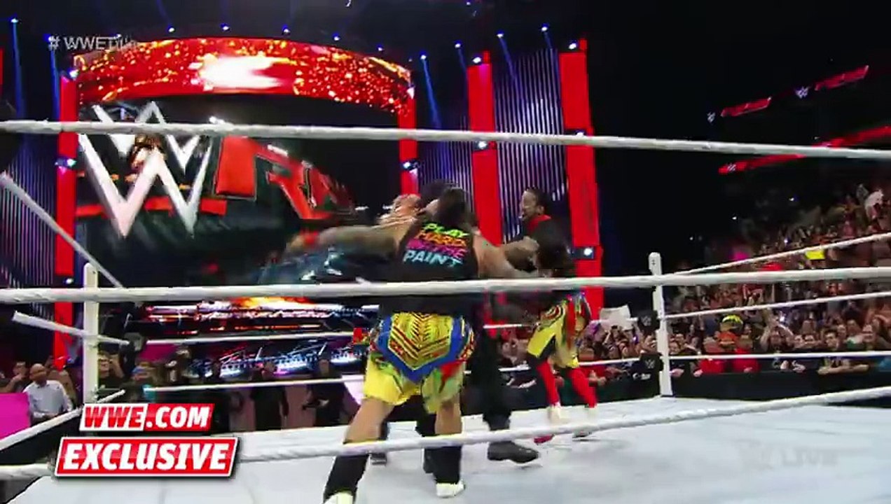 Roman Reigns celebrates the WWE World Heavyweight Title In WWE TCL 2015