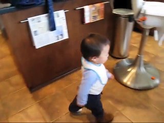 Baby making interesting conversation with dog