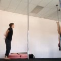 Dancer Performs Dragon Flag on Pole