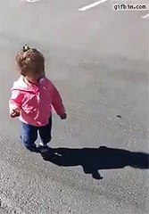 little girl gets scared of her own shadow