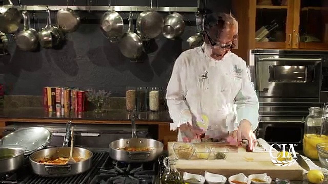 Stuffed Olives Braised in Spicy Tomato Sauce with White Beans