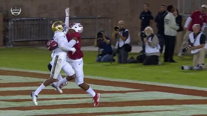 Réception dans le dos d'un défenseur (Foot US)