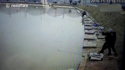 Fisherman loses epic battle with fish and ends up in the water