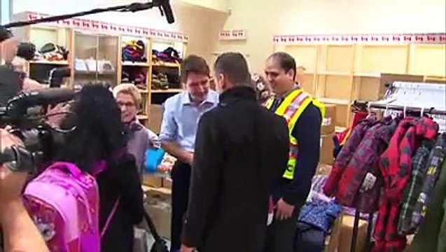 Canadian Prime Minister Justin Trudeau greet Syrian refugees upon their arrival in Toronto, Canada