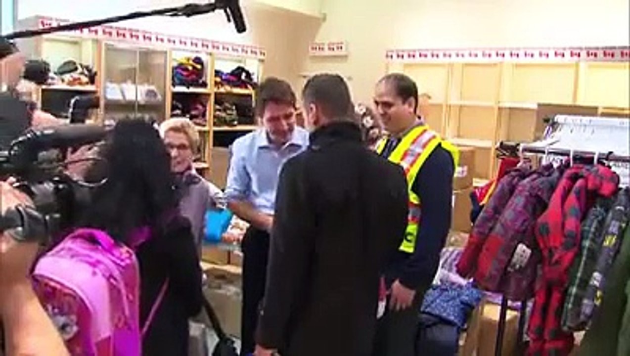 Canadian Prime Minister Justin Trudeau greet Syrian refugees upon their arrival in Toronto, Canada