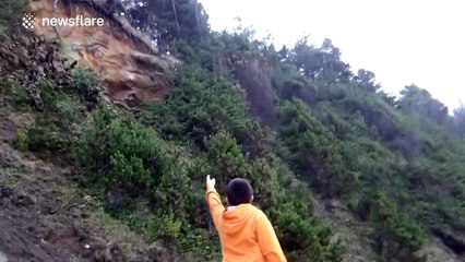 Sea foam covers beach in Oregon