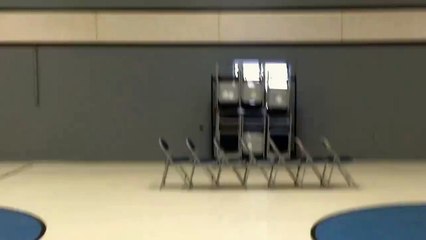 Teen Tries To Clear Row Of Chairs