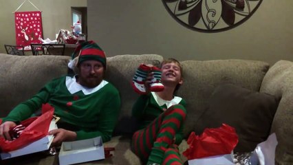Father And Son Open The Best Christmas Present Ever