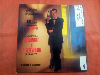 UN PINGüINO EN MI ASCENSOR.''LA SANGRE Y LA TELEVISION.''.(LA VACA SE RIE.)(12'' LP.)(1990.)