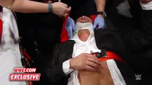 Triple H helped by paramedics after being attacked by Roman Reigns׃ WWE.com Exclusive, Dec. 13, 2015
