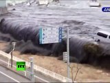 New dramatic video: Tsunami wave spills over seawall, smashes boats, cars Allah ka azab