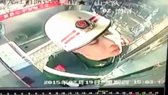 Tired fireman dozes off