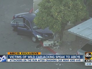 Pair carjack victims at gunpoint, crash stolen car