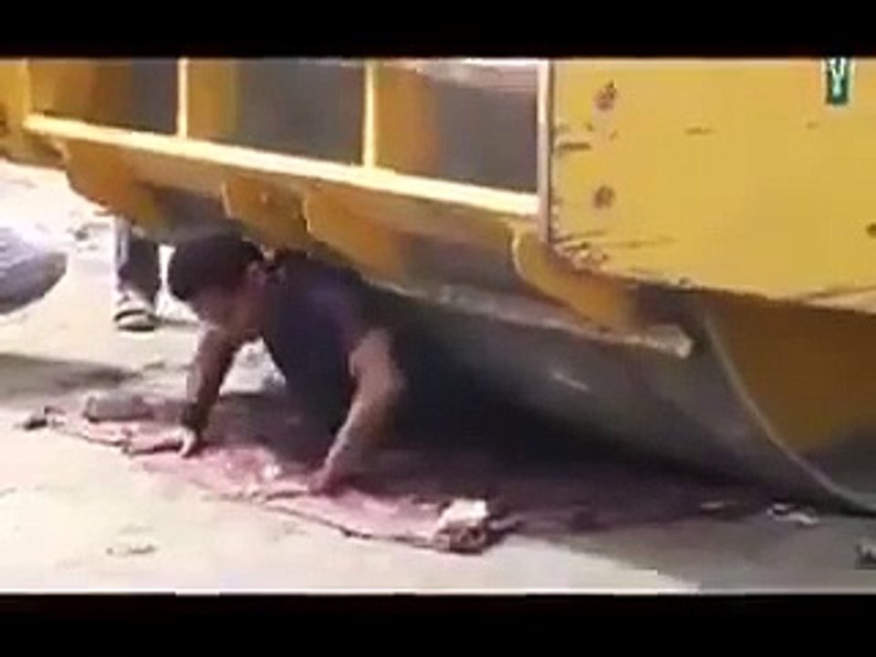 The man was bearing the weight of the bulldozer