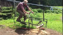 Guy build a Saw connected to a Bike to cut wood while cycling