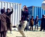 US Army girl dancing with Pathan boys on Pashto songs