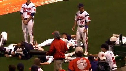 Baseball players find a new way to amuse themselves during a rain delay﻿