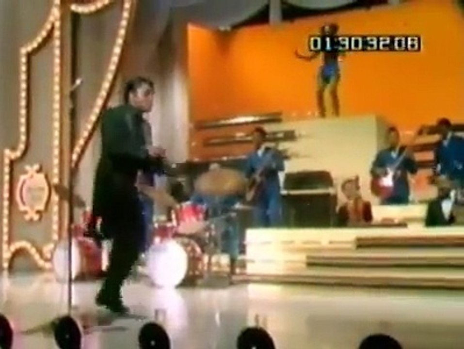 Check out how the Godfather of Soul turns em' out.And peep his exit. 