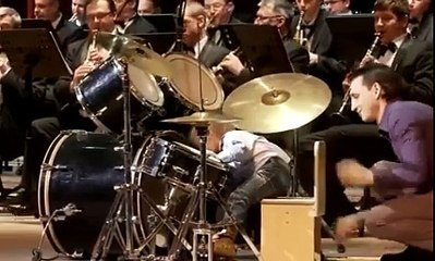 Music-Crowns---3-Year-Old-Drummer-Leads-Orchestra-fbdown.net