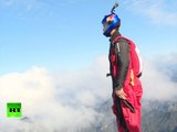 Chinese first wingsuit man jumps off cliff, flies 2km through clouds