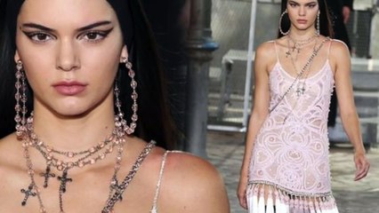 Kendall Jenner goes bra less in revealing see through top at Paris fashion show
