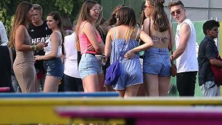 Brooklyn Beckham entertains a group of female fans at Wireless Festival before hanging out