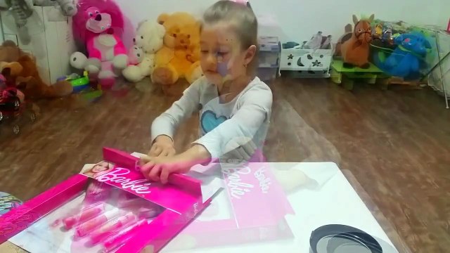 Barbie makeup set tutorial for children . Kit for girls. Cute video
