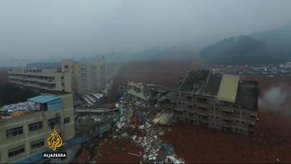China continues to search for missing after landslide