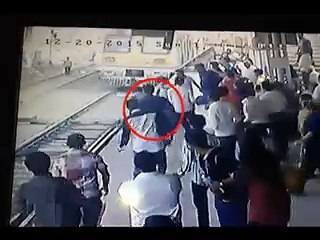 CCTV Footage of kid pulled from jaws of death