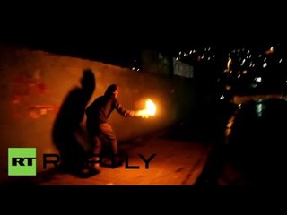 Protesters set bus on fire, build barricades in clash with police in Istanbul