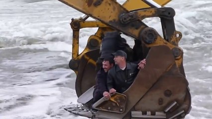 In Russia you cross River thanks to backhoe loaders!!