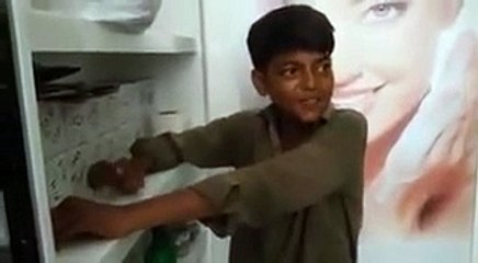 Young boy singing Dhola