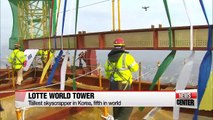 Lotte World Tower tops-off