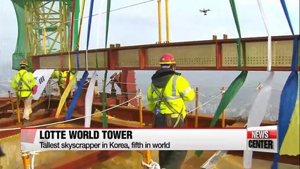 Lotte World Tower tops-off