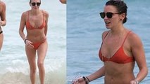 Katie Cassidy Flashes Abs In Skimpy Bikini At Miami Beach