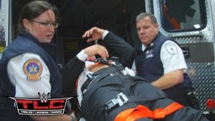 Triple H is loaded into an ambulance after being attacked by Roman Reigns: December 13, 20