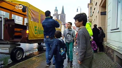 Flüchtlinge feiern Weihnachten | DW Nachrichten