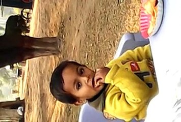 Little Enjoying with treat in Garden