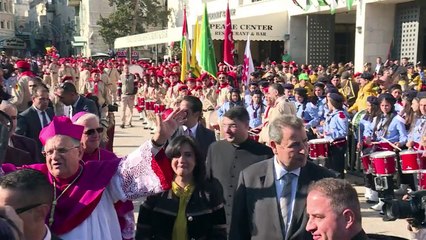 Peregrinos comemoram o natal em Belém