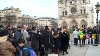 Attacks cast pall over Notre Dame Christmas mass in Paris