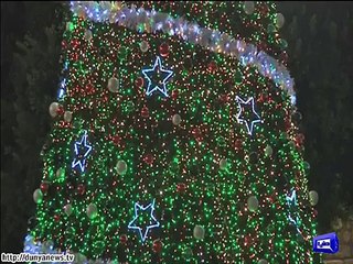 Japanese santa goes underwater to surprise fish.