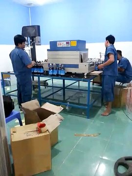 Máy rút màng co cho nhãn chai, máy rút màng co hộp, máy bọc màng co PVC