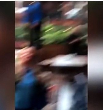 Watch rowdy Stoke fans get sprayed with FIRE EXTINGUISHER by angry barmaid