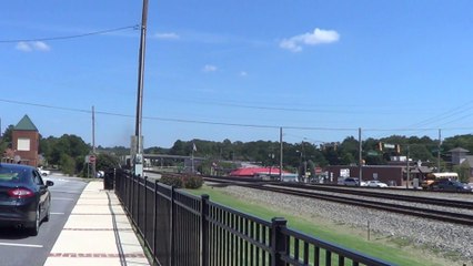 8-26-14 2:35 PM BNSF power leads NS 282 NB through Austell Ga.