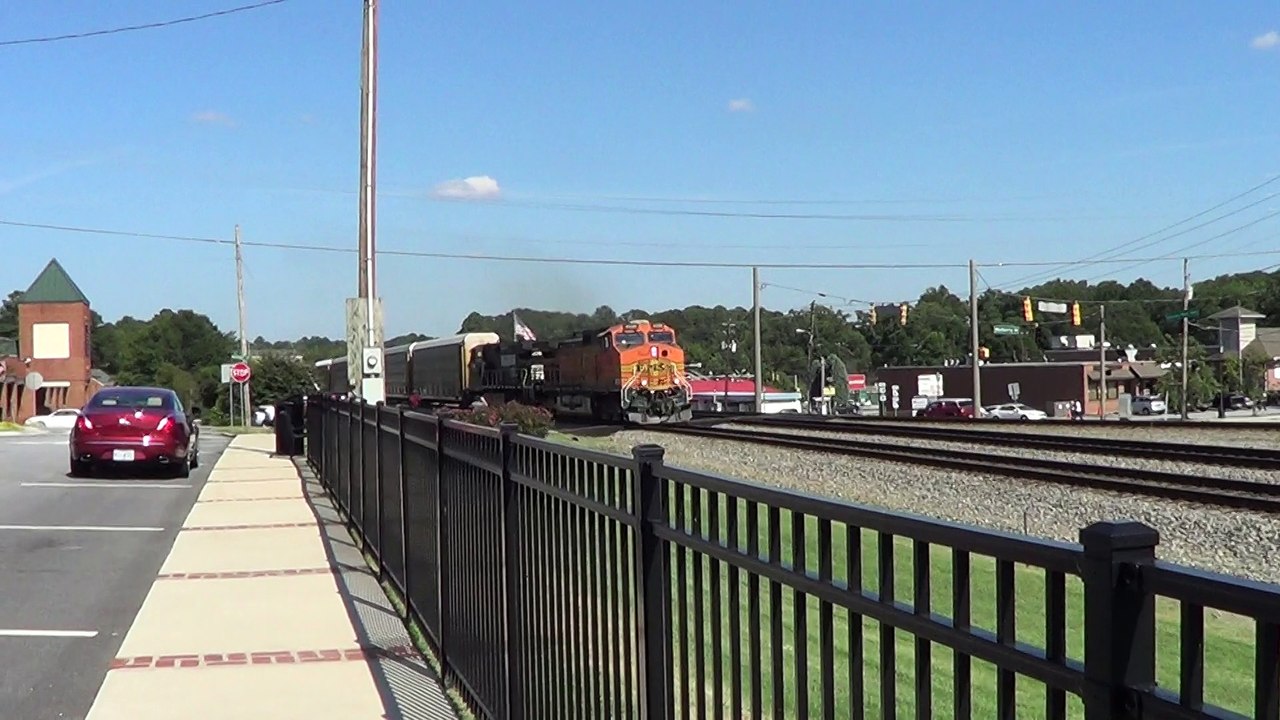8-26-14 4:34 PM BNSF power leads NS 276 NB through Austell Ga.