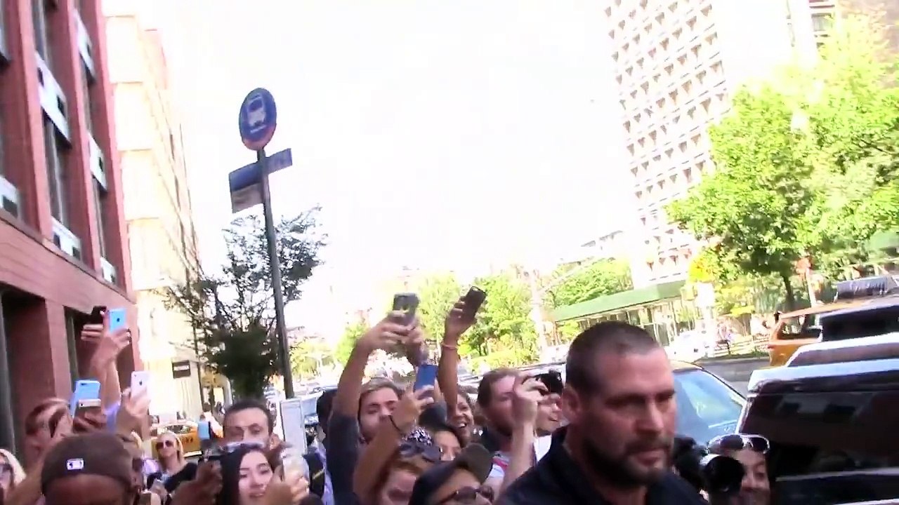 Pregnant Kim Kardashian Squeezes Curves Into Skintight Dress In NYC