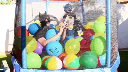 Worlds BIGGEST BATMAN Balloon Pit! Little Tikes Trampoline with Little Batman Surprise Toys