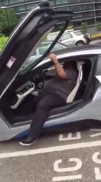 Rich Fat Guy can't get out his luxury BMW Car...