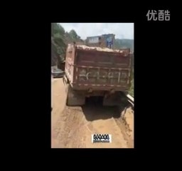 Truck falls off road in China