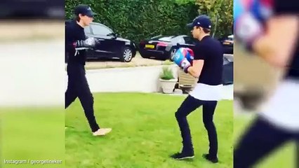 Gary Lineker play fights with brother Angus in instagram video